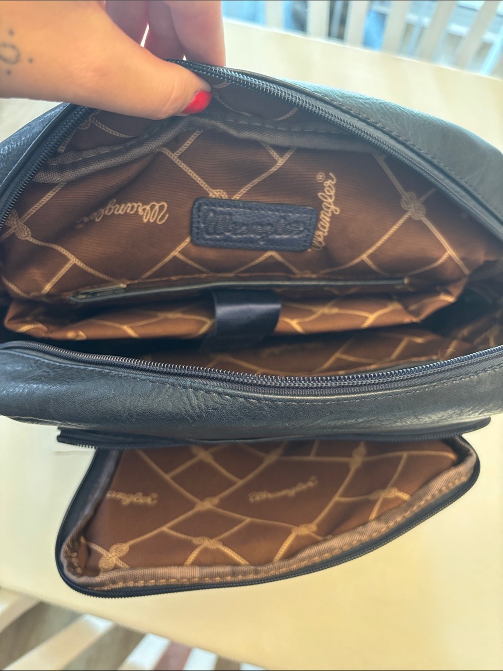 Wrangler Navy Faux Leather Backpack with Buckle Flap and laptop sleeve - Picture 4 of 4